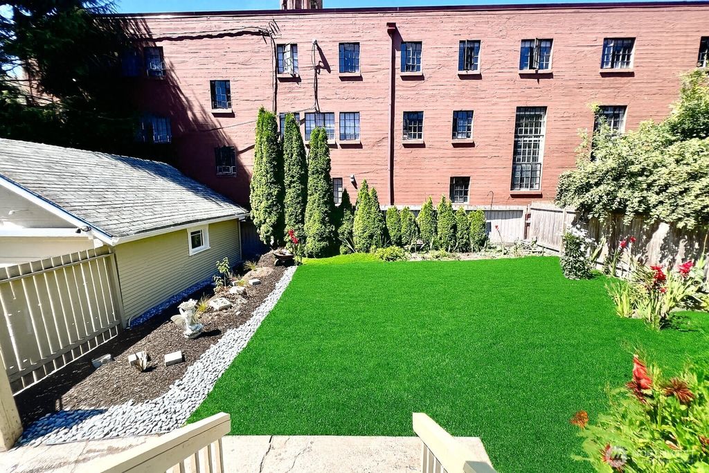 Photo of 6515 22nd Ave NW Ave, Seattle, WA 98117 (MLS # 2414792)