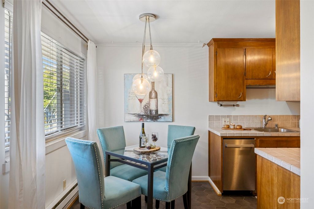 Photo of 4451 Woodland Park Avenue N #4, Seattle, WA 98103 (MLS # 2248797)
