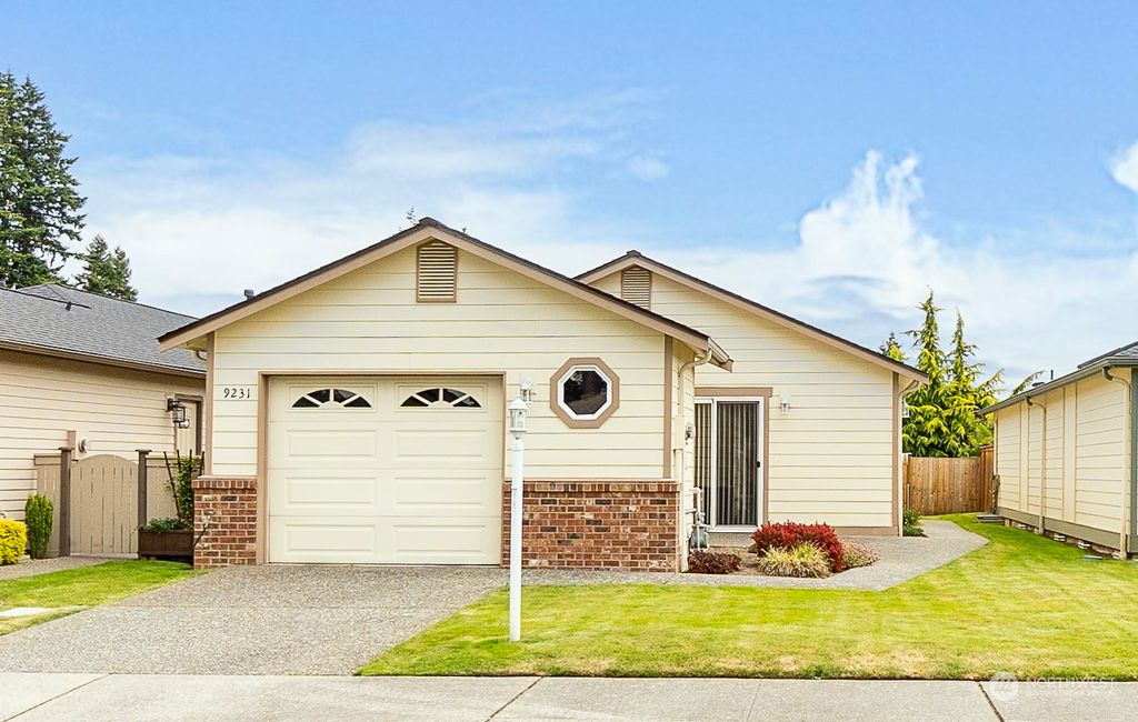 Photo of 9231 45th Drive NE, Marysville, WA 98270 (MLS # 2130202)