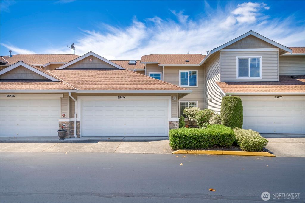 Photo of 6547 Lindsay Avenue SE #18C, Auburn, WA 98092 (MLS # 2402854)