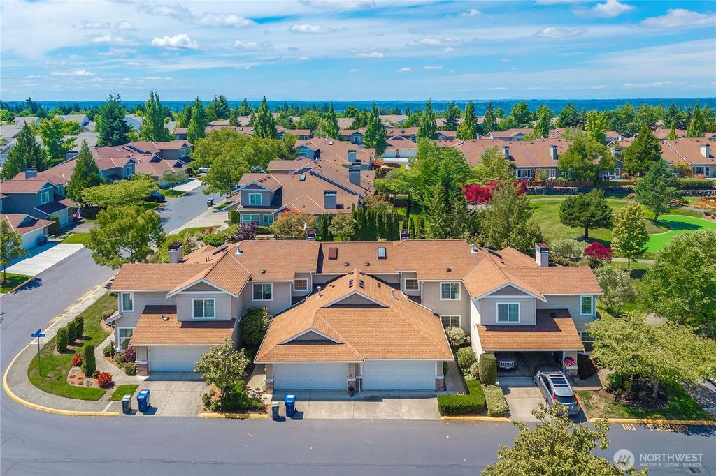 Photo of 6547 Lindsay Avenue SE #18C, Auburn, WA 98092 (MLS # 2402854)