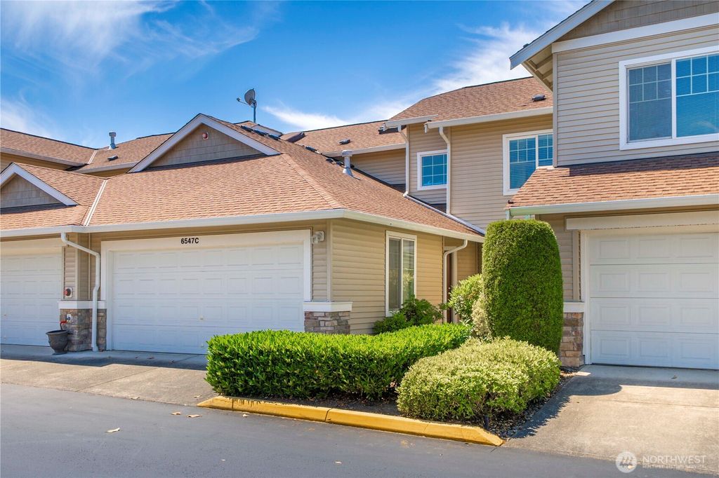 Photo of 6547 Lindsay Avenue SE #18C, Auburn, WA 98092 (MLS # 2402854)