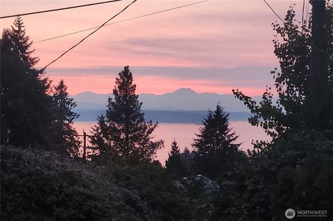 Photo of 9111 40th Avenue SW, Seattle, WA 98136 (MLS # 2422372)