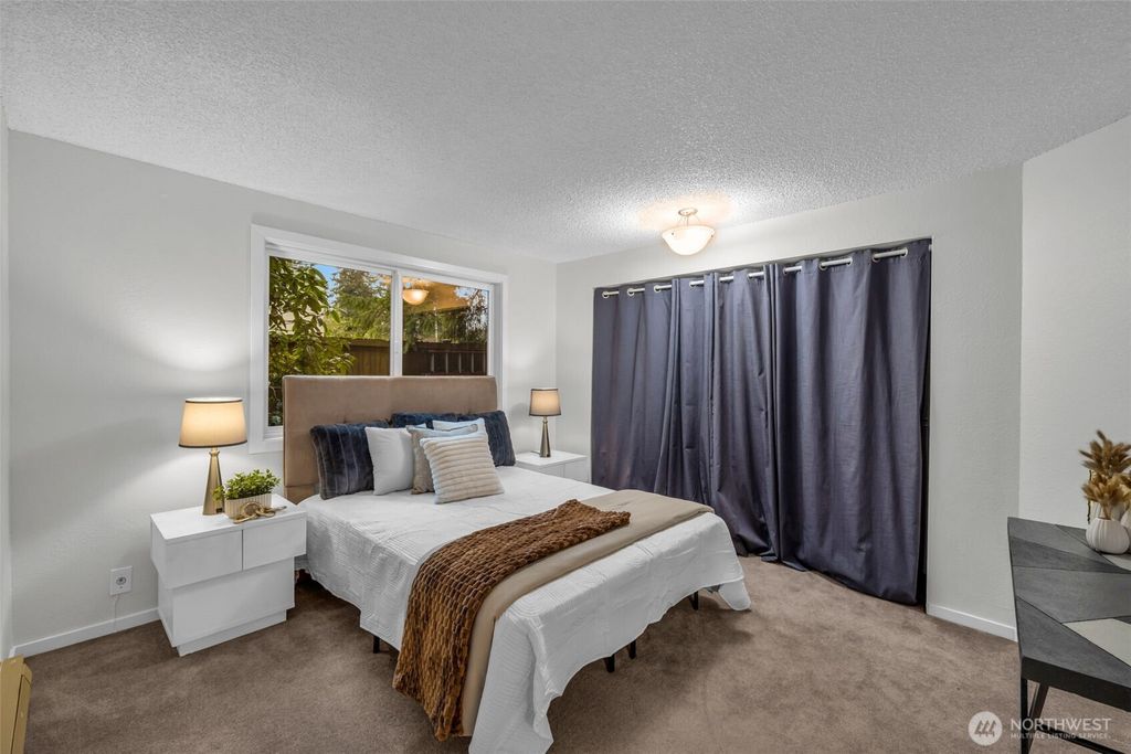 Photo of 11401 Roosevelt Way NE #1, Seattle, WA 98125 (MLS # 2484911)