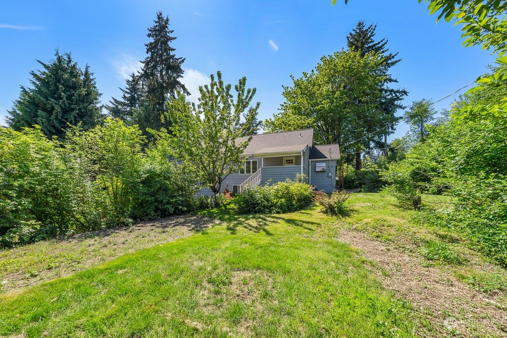 Photo of 12007 8th Avenue S, Seattle, WA 98168 (MLS # 2070979)
