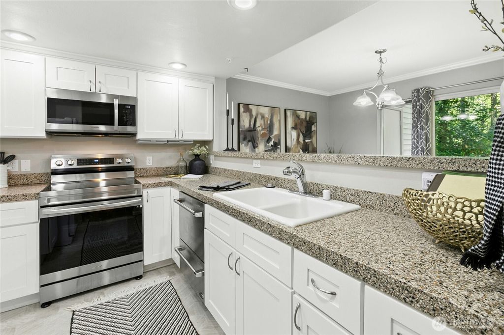 Photo of 25235 SE Klahanie Blvd Blvd #G102, Sammamish, WA 98029 (MLS # 2420380)