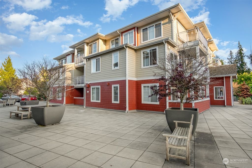 Photo of 517 225th Lane NE #E204, Sammamish, WA 98074 (MLS # 2077438)
