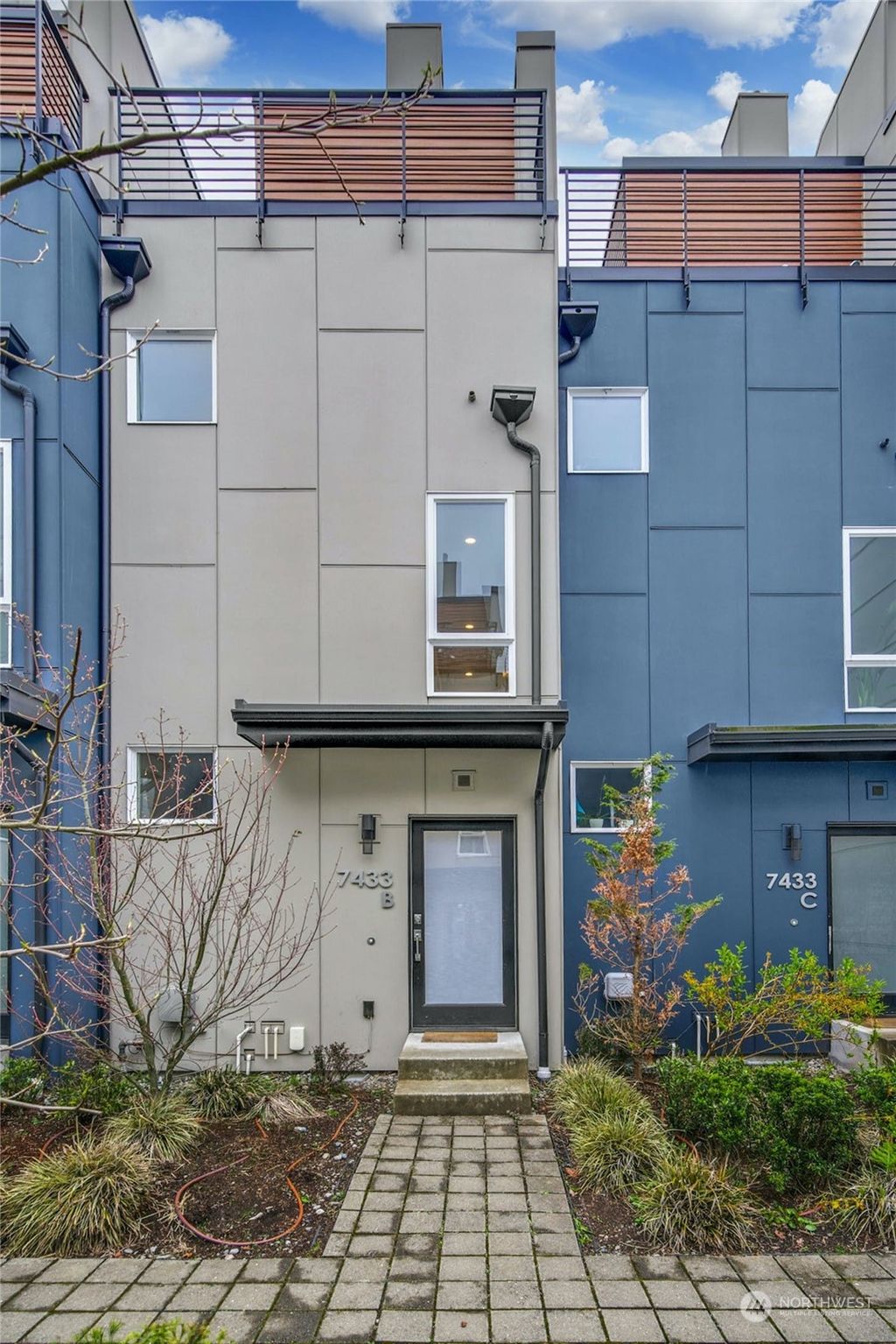 Photo of 7433 4th Avenue NE #B, Seattle, WA 98115 (MLS # 2058297)