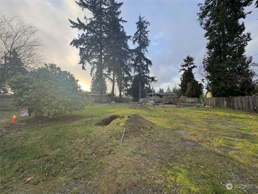 Photo of 20015 13th ave Ave, SeaTac, WA 98198 (MLS # 2317498)