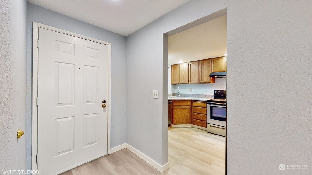 Photo of 15278 Sunwood Boulevard #C23, Tukwila, WA 98188 (MLS # 2067340)