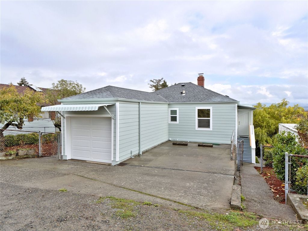 Photo of 5029 29th Avenue S, Seattle, WA 98108 (MLS # 2417450)