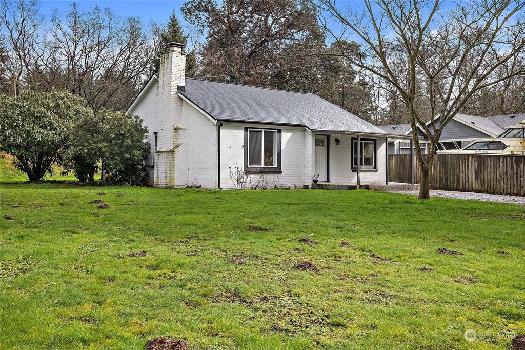 Photo of 12058 5th Avenue S, Seattle, WA 98168 (MLS # 2209500)