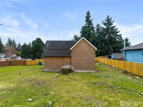 Photo of 11205 12th Avenue SW, Seattle, WA 98146 (MLS # 2469139)