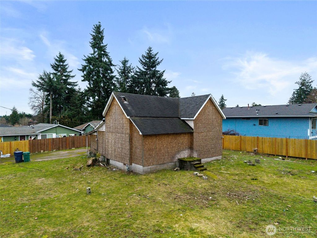 Photo of 11205 12th Avenue SW, Seattle, WA 98146 (MLS # 2469139)