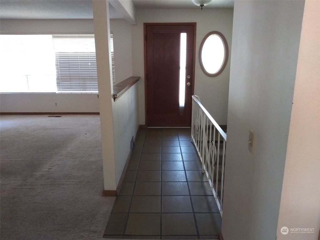 Photo of 11922 64th Place S, Seattle, WA 98178 (MLS # 2273962)