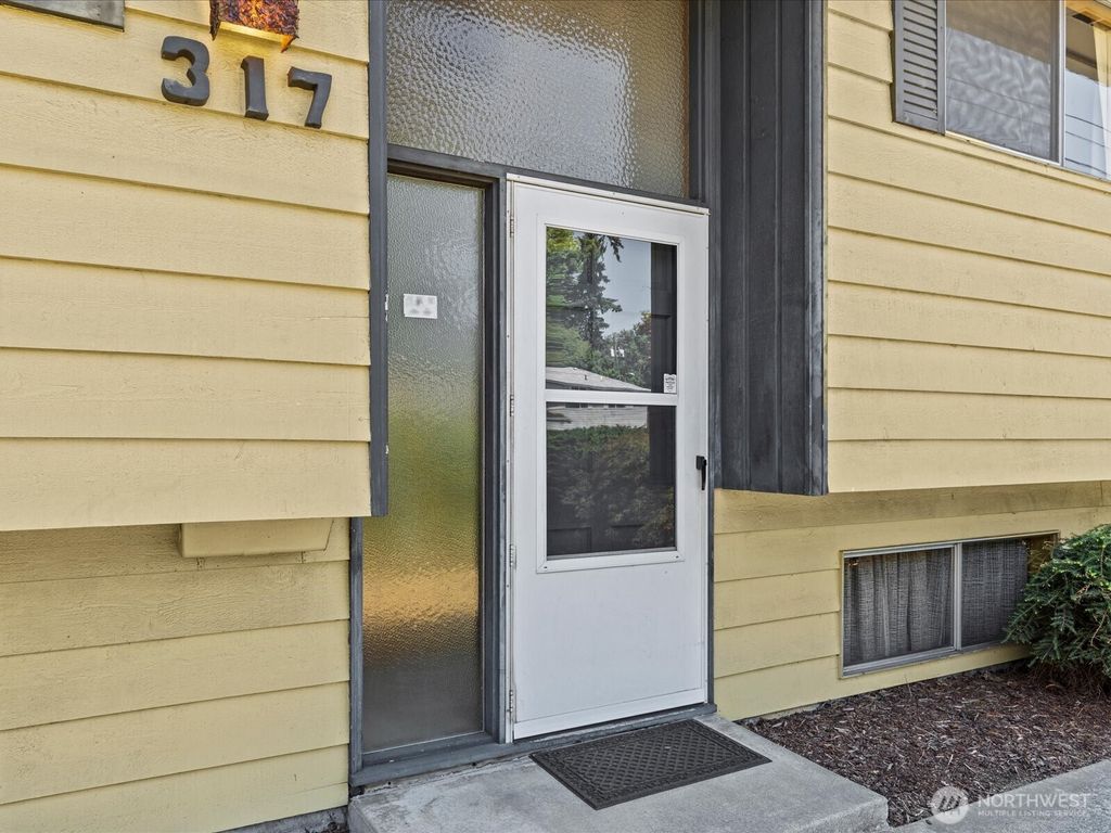 Photo of 317 S 116th Street, Burien, WA 98168 (MLS # 2379488)