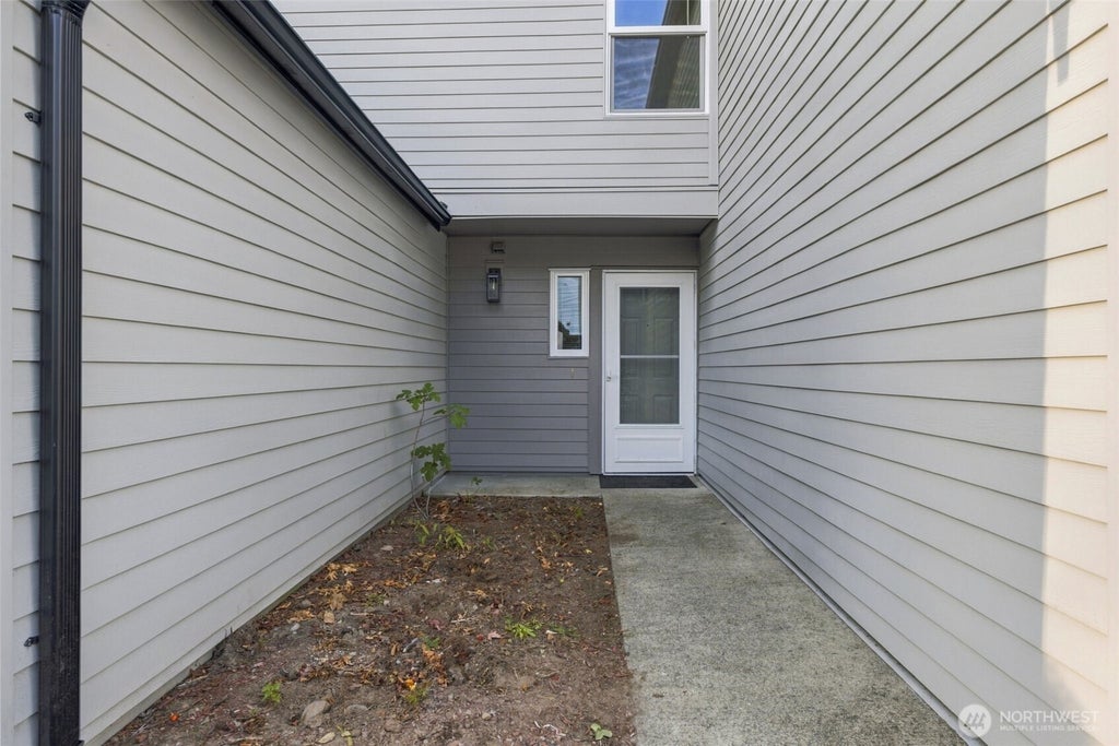 Photo of 6704 S 239TH Place #B102, Kent, WA 98032 (MLS # 2587713)