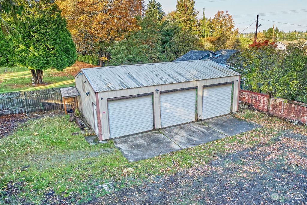 Photo of 8709 9th Avenue NW, Seattle, WA 98117 (MLS # 2178097)