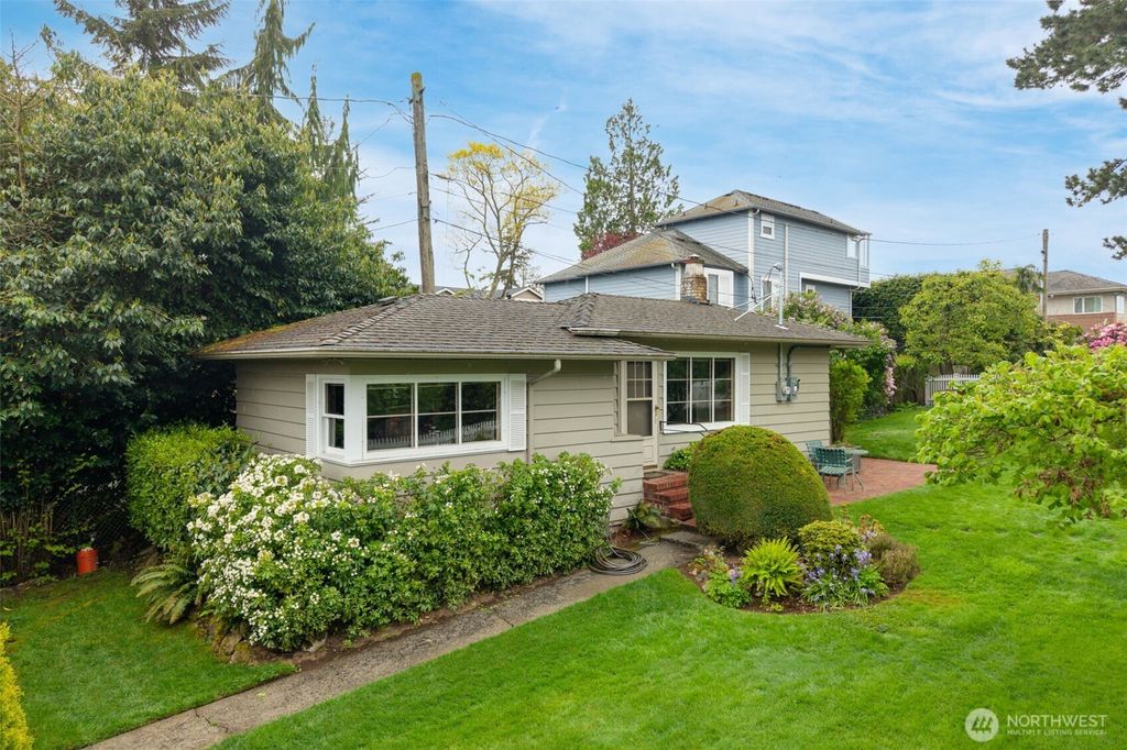 Photo of 12231 12th Avenue NW, Seattle, WA 98177 (MLS # 2367467)