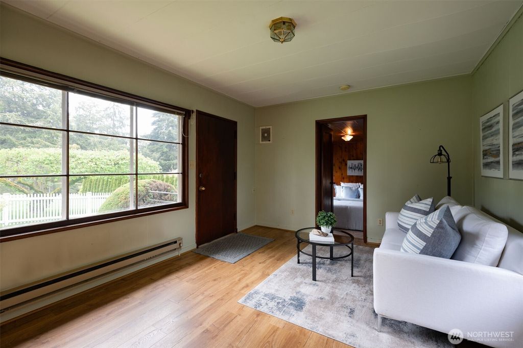 Photo of 12231 12th Avenue NW, Seattle, WA 98177 (MLS # 2367467)