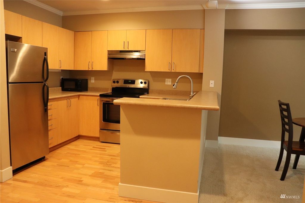 Photo of 19500 Ballinger Way NE #207, Shoreline, WA 98155 (MLS # 1980456)