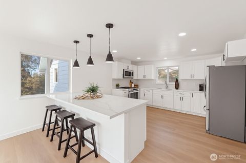 Photo of 8305 Duncan Avenue S, Seattle, WA 98118 (MLS # 2456116)