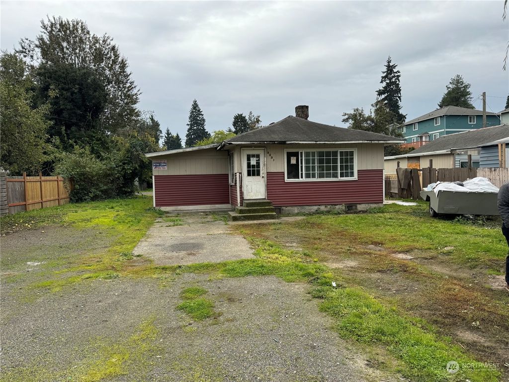 Photo of 14613 Military Road S, Tukwila, WA 98168 (MLS # 2251342)