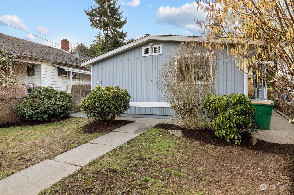 Photo of 5009 26th Avenue SW, Seattle, WA 98106 (MLS # 2032122)