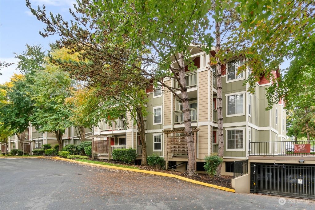 Photo of 7711 NE 175th Street #C107, Kenmore, WA 98028 (MLS # 2298248)