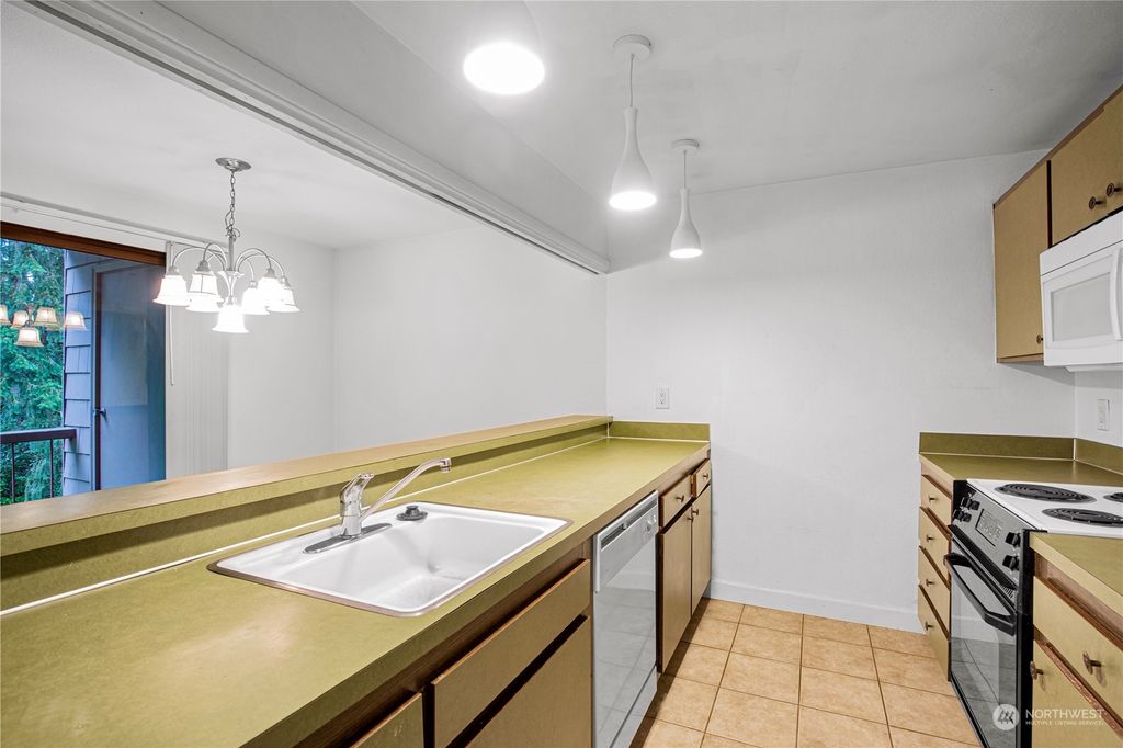 Photo of 6858 139th Avenue NE #711, Redmond, WA 98052 (MLS # 2202414)