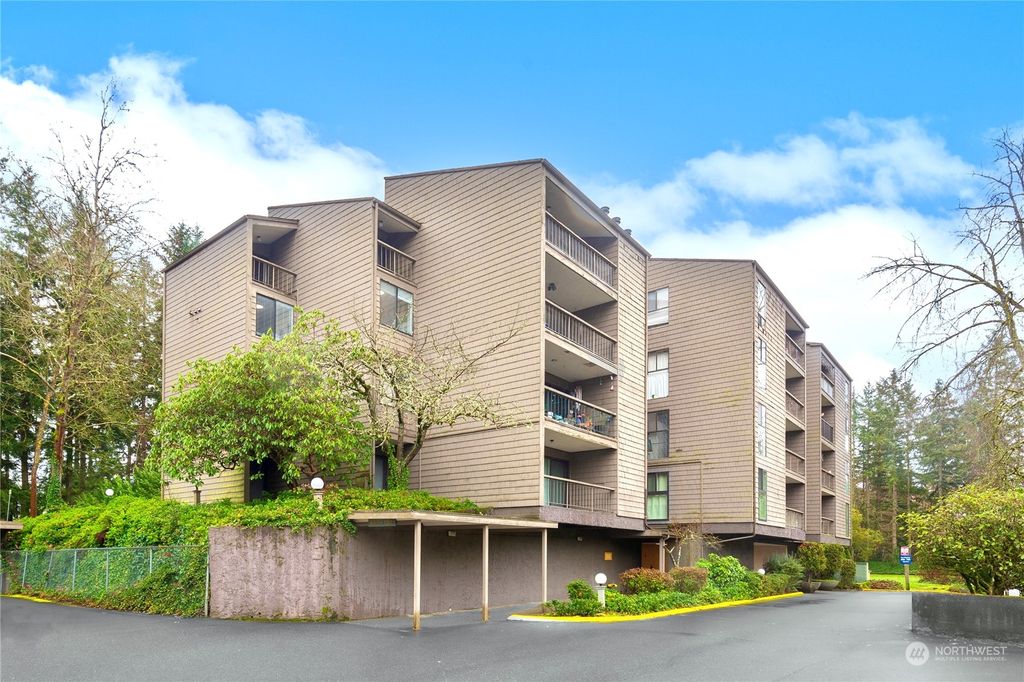 Photo of 6858 139th Avenue NE #711, Redmond, WA 98052 (MLS # 2202414)