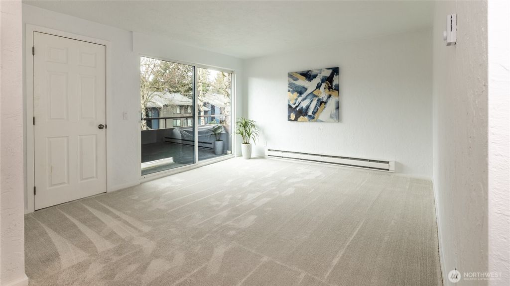 Photo of 2100 N 106th St #307, Seattle, WA 98133 (MLS # 2470948)