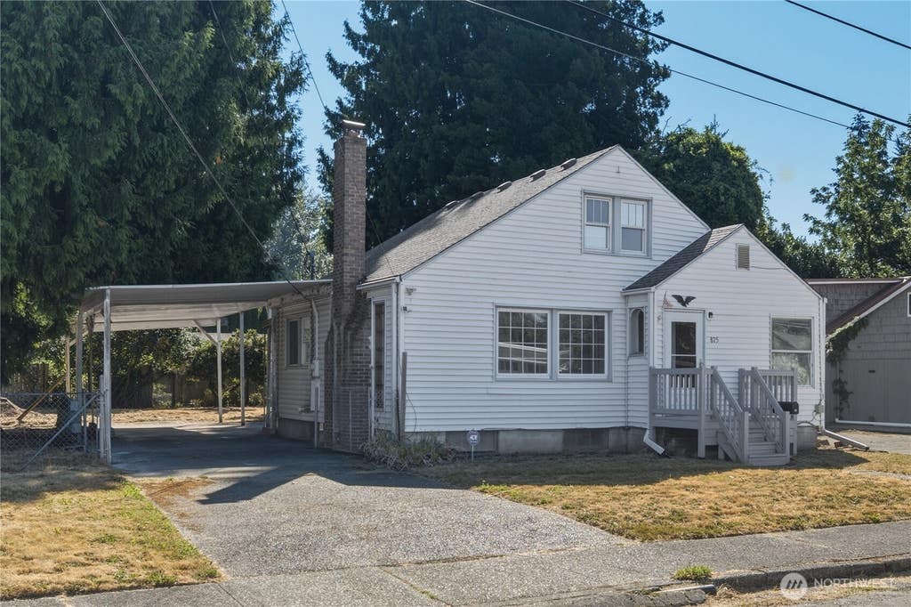 Photo of 825 8th St NW ST, Puyallup, WA 98371 (MLS # 2572313)