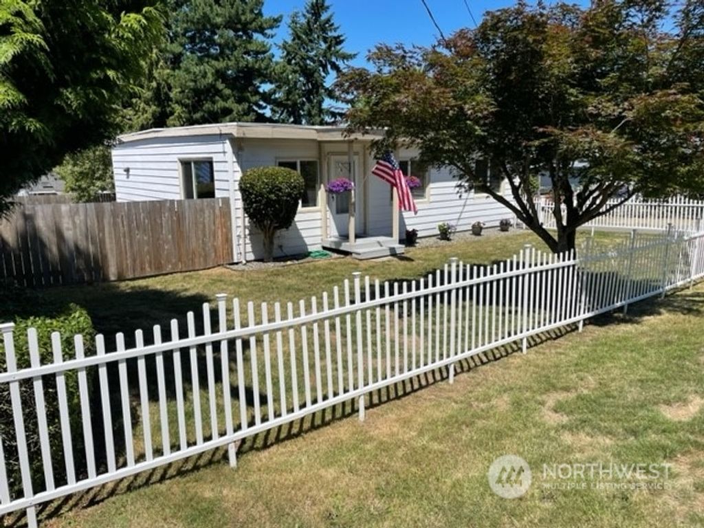 Photo of 10717 24th Avenue SW, Seattle, WA 98146 (MLS # 2134108)