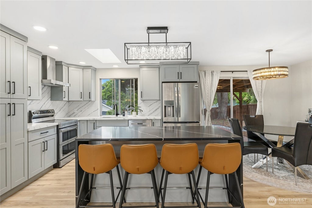 Photo of 11212 NE 145th Street, Kirkland, WA 98034 (MLS # 2571235)