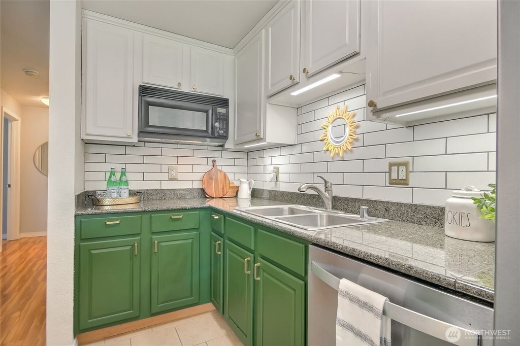 Photo of 20320 Bothell Everett Hwy #D102, Bothell, WA 98012 (MLS # 2500548)