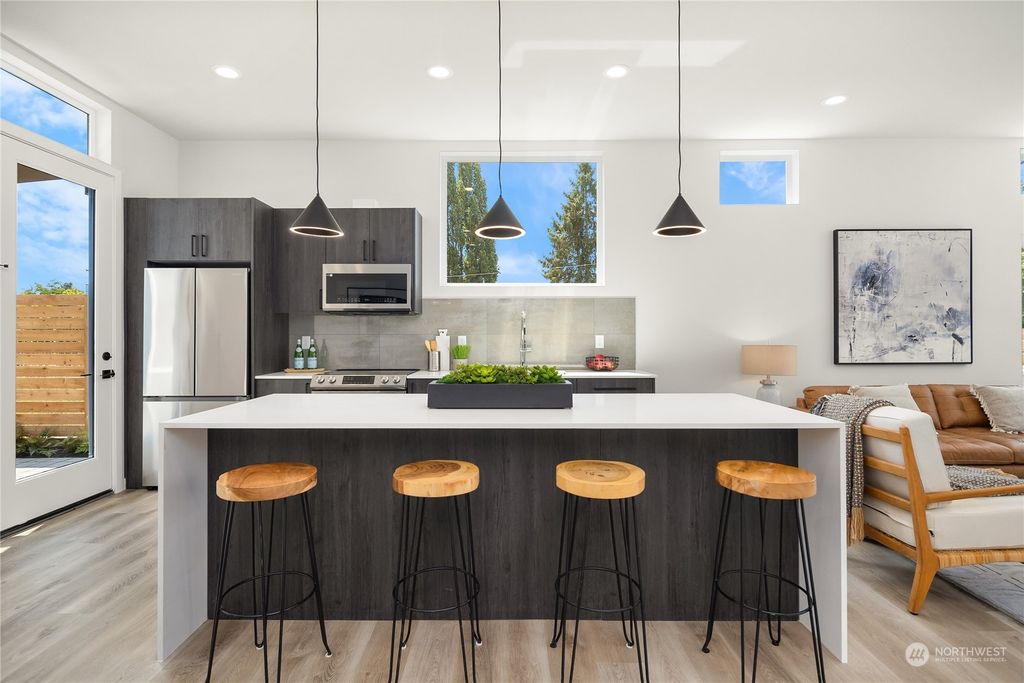 Photo of 8306 13th Avenue NW #A, Seattle, WA 98117 (MLS # 2131294)