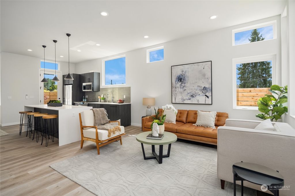 Photo of 8306 13th Avenue NW #A, Seattle, WA 98117 (MLS # 2131294)
