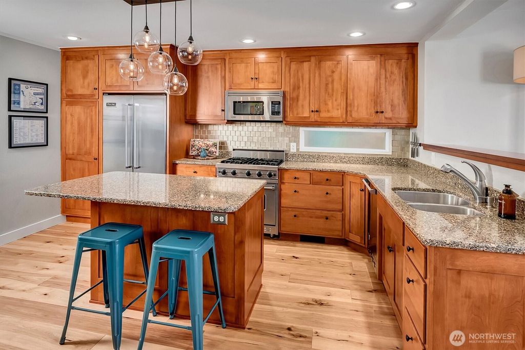 Photo of 11262 Riviera Place NE, Seattle, WA 98125 (MLS # 2491446)