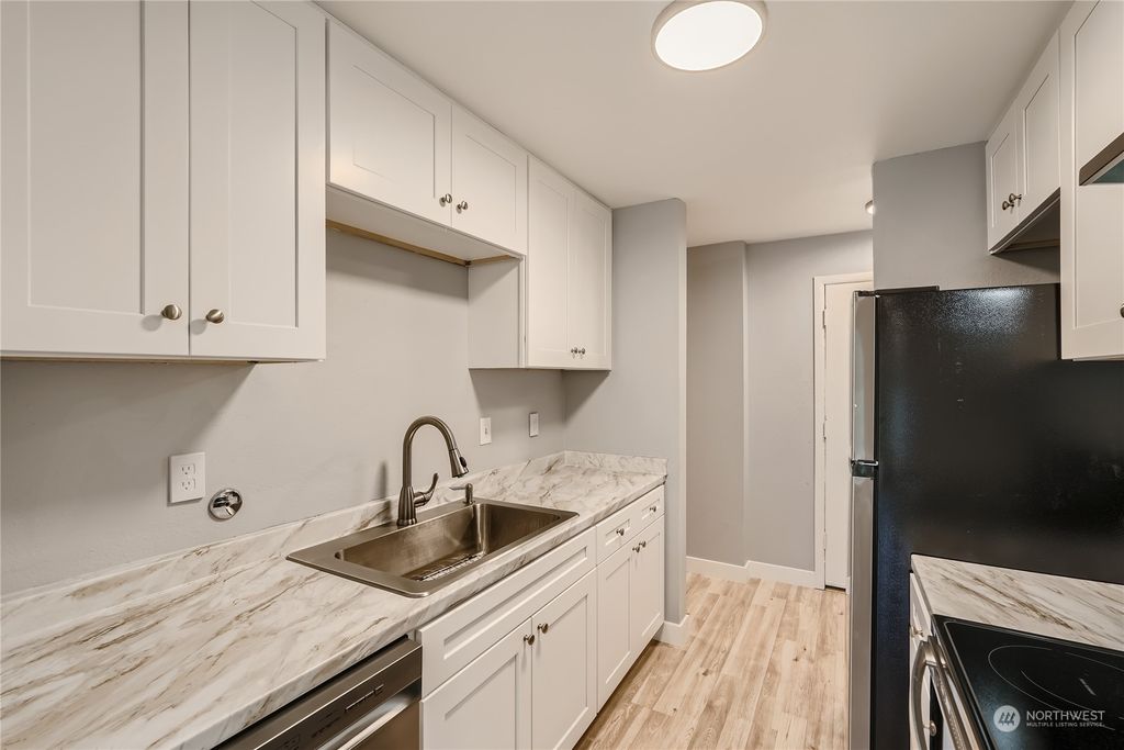 Photo of 15144 65th Avenue S #418, Tukwila, WA 98188 (MLS # 2176319)