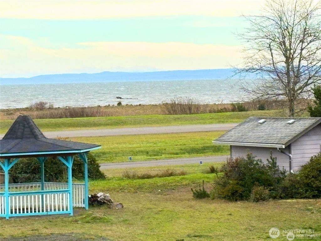 Photo of 415 Olympic View Drive NE, Ocean Shores, WA 98569 (MLS # 2474686)