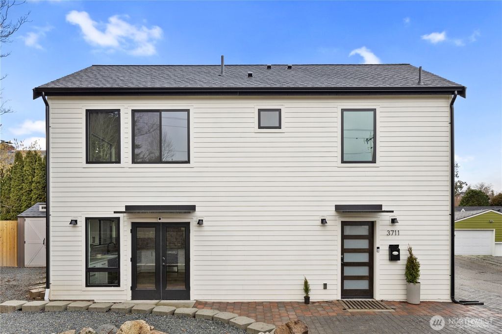 Photo of 3711 SW Juneau Street, Seattle, WA 98126 (MLS # 2334438)