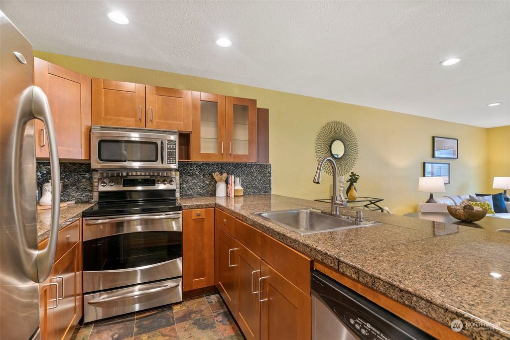 Photo of 5824 NE 75th Street #D103, Seattle, WA 98115 (MLS # 2003578)