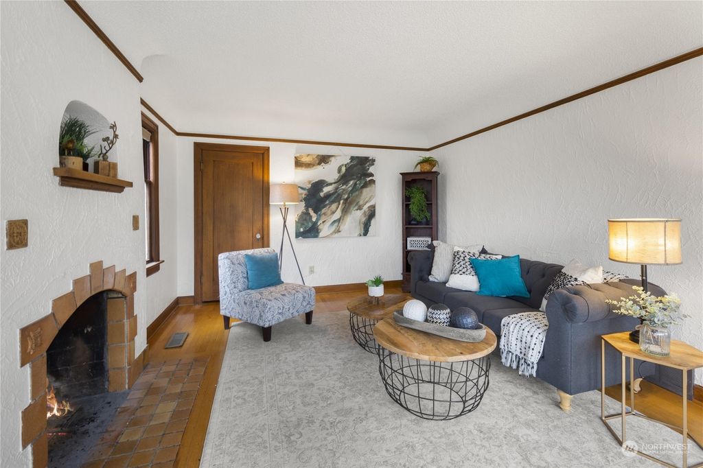 Photo of 7701 12th Avenue NW, Seattle, WA 98117 (MLS # 2040954)