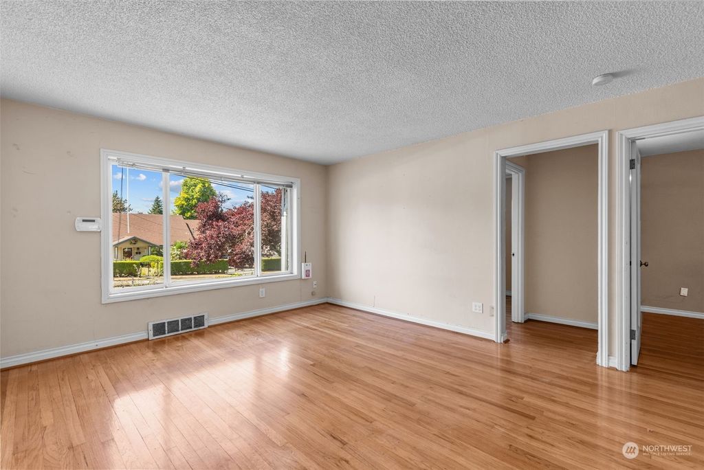 Photo of 9912 59th Avenue S, Seattle, WA 98118 (MLS # 2145695)