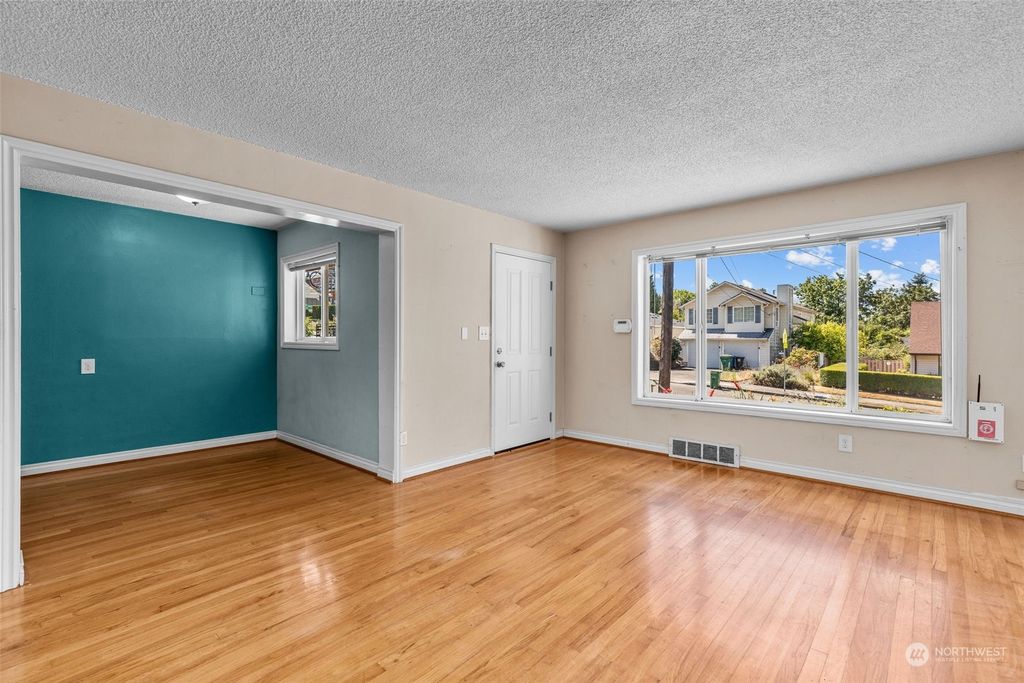 Photo of 9912 59th Avenue S, Seattle, WA 98118 (MLS # 2145695)