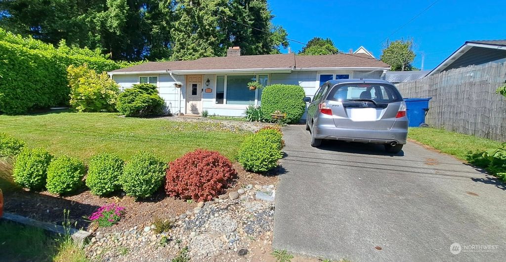 Photo of 10809 10th Avenue SW, Seattle, WA 98146 (MLS # 2148106)