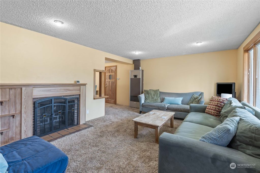 Photo of 10809 10th Avenue SW, Seattle, WA 98146 (MLS # 2148106)