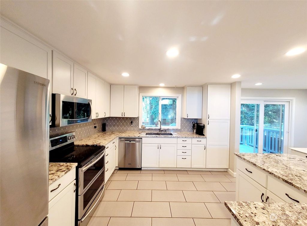 Photo of 1610 Olympia Avenue SE, Renton, WA 98058 (MLS # 2038239)