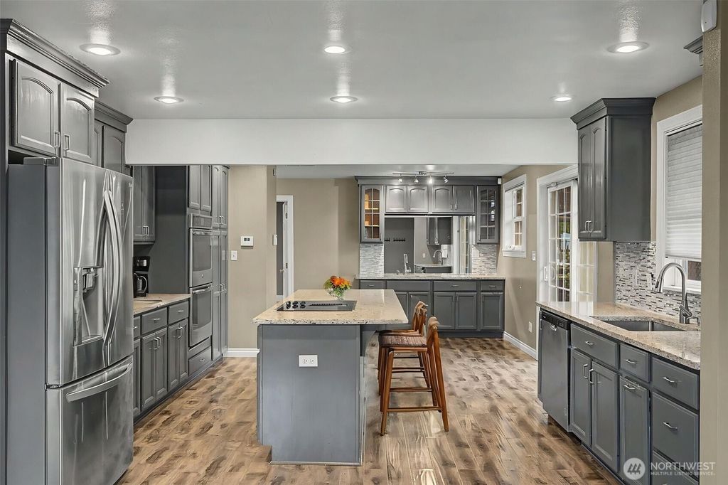 Photo of 2502 NE 7th Street, Renton, WA 98056 (MLS # 2501515)